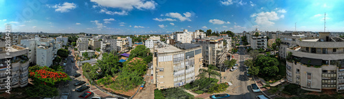 Aerial drone panorama of the urban streets view of the city Ness Ziona- Israel