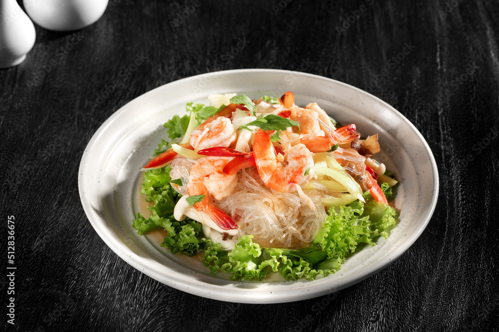 close up view of nice yummy noodle shrimps on grey back close up view of nice yummy noodle shrimps on grey back