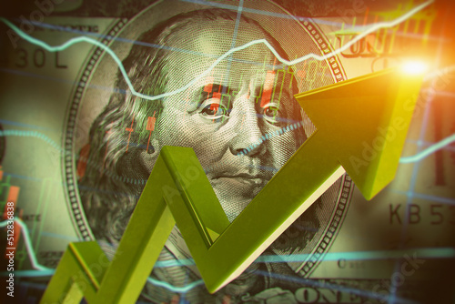 Economist forecast for the United States. Glowing green arrow going upwards on 100 dollar bill. The appreciation and rise of the US dollar. Price increases per dollar. Closeup detail of dollar bill.