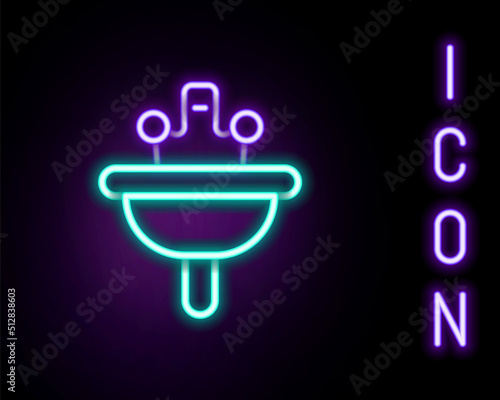 Glowing neon line Washbasin with water tap icon isolated on black background. Colorful outline concept. Vector