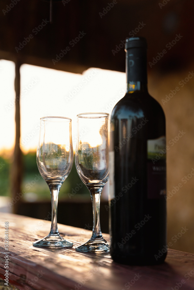wine bottle and glass on table