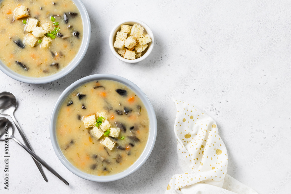Vegan gluten free coconut milk mushroom soup. Top view, copy space. Vegan gluten free coconut milk mushroom soup. Top view, copy space.