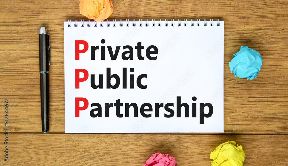 Fototapeta premium PPP private public partnership symbol. Concept words PPP private public partnership on white note on beautiful wooden background. Business PPP private public partnership concept. Copy space