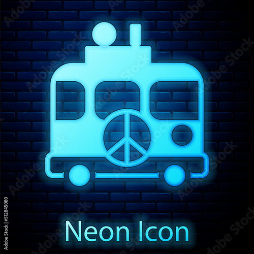 Glowing neon Hippie camper van icon isolated on brick wall background. Travel by vintage bus. Tourism, summer holiday. Vector