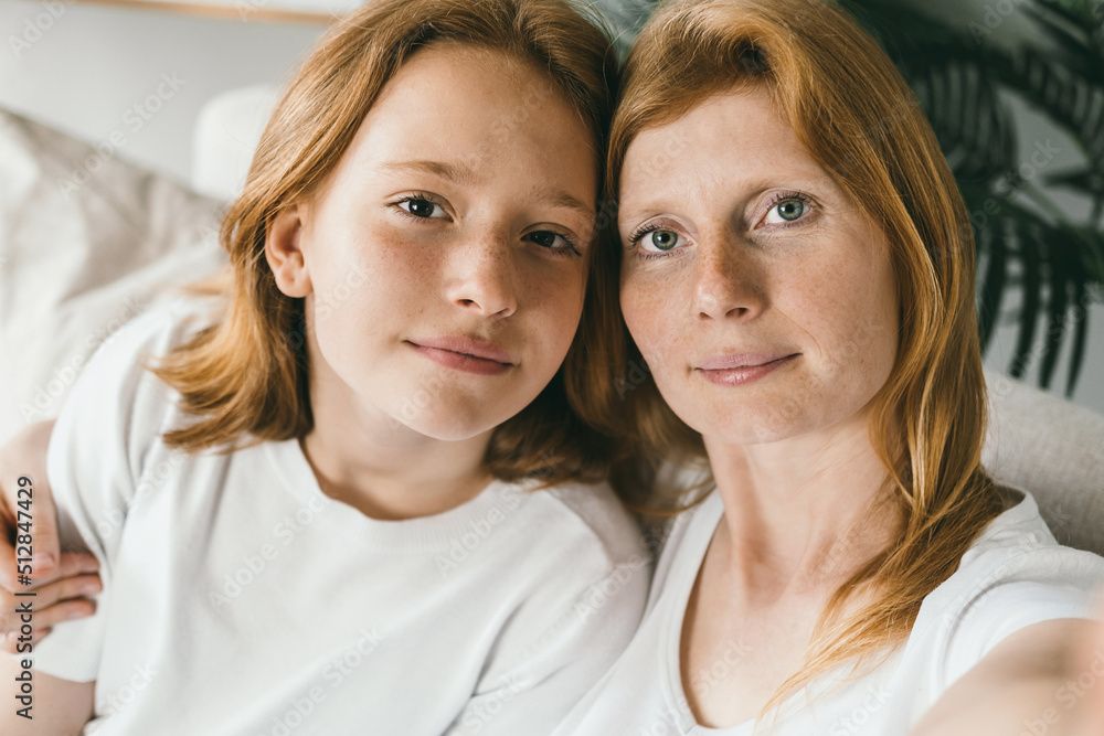 Candid portrait of mother and teenager girl Candid portrait of mother and teenager girl