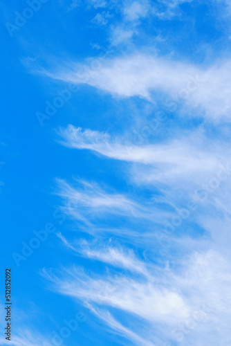 White heap clouds in the blue peaceful sky. The concept of psychological calmness and health. Peace of mind with the forces of nature. Air travel concept.
