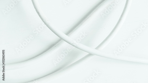 White electric wire on a white background