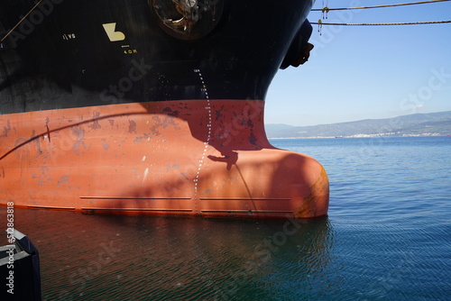 Ship's head tied to the pier with a rope in the port photo