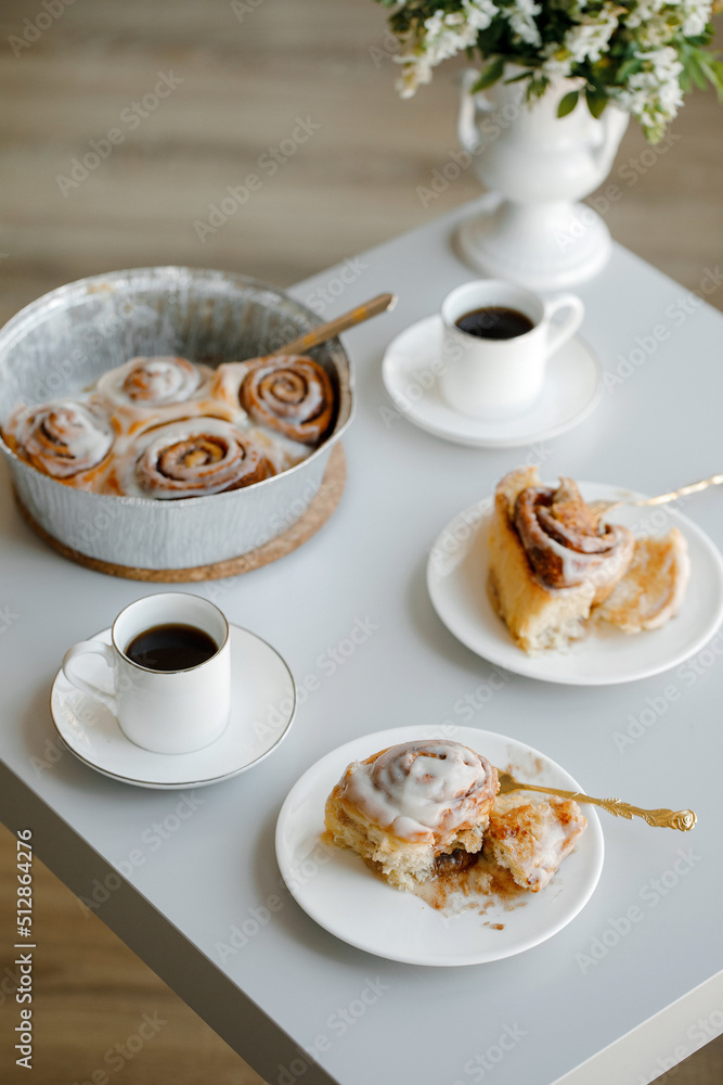 Cinnabons rools to a coffee with a great background Cinnabons rools to a coffee with a great background