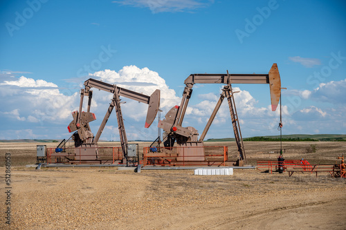  Pumpjacks working in the oil fields of Alberta on a spring day.