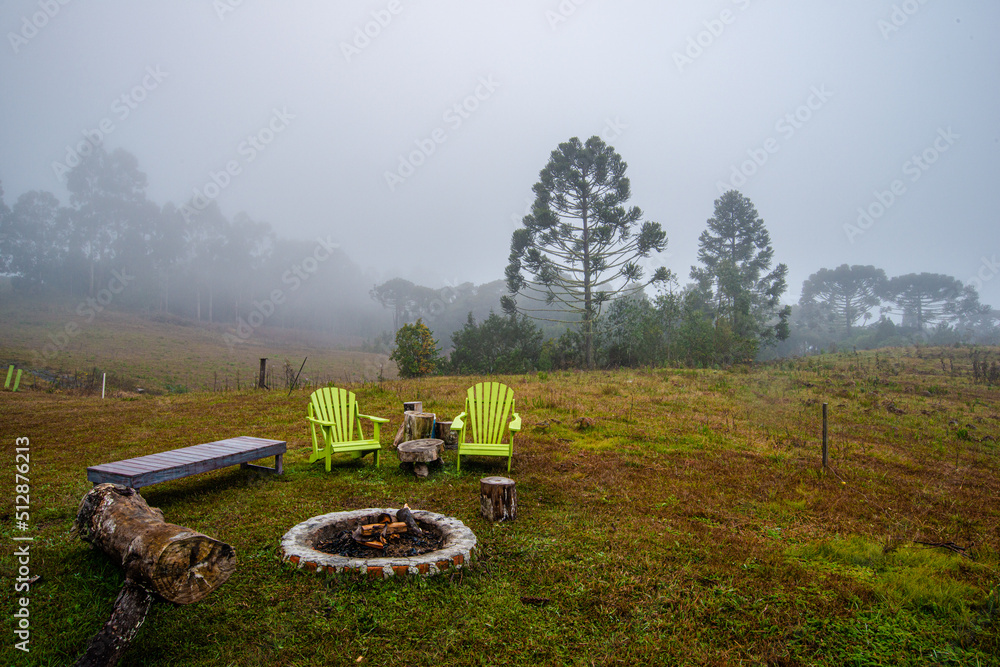 Ground fire space with chairs and benches in the mountains of Santa Catarina Ground fire space with chairs and benches in the mountains of Santa Catarina