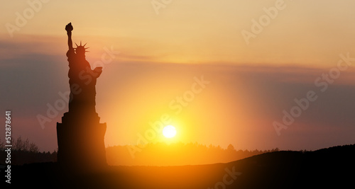 Silhouettes of The Statue of Liberty at sunset. Greeting card for Independence Day.