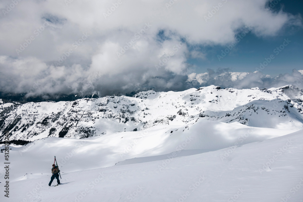 A man carries his skis in Goat Rocks Wilderness. A man carries his skis in Goat Rocks Wilderness.