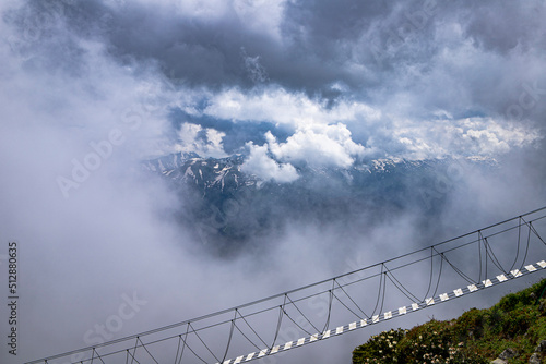 suspension bridge between mountains