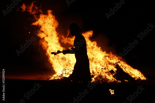 Silhouette of a man in a bonfire