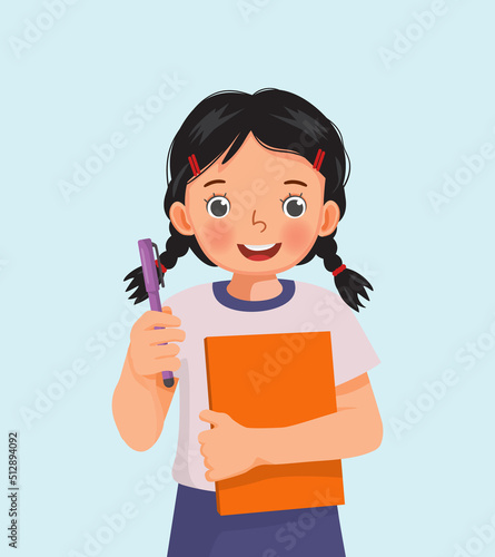 cute little girl student holding book and pen smiling