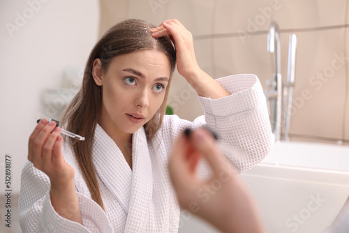 Beautiful young woman with ...