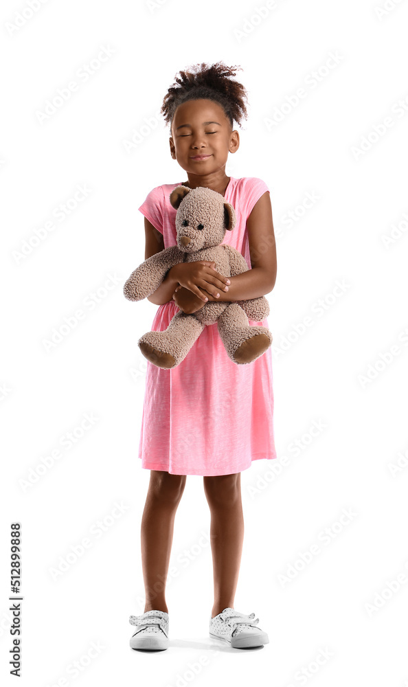 Little African-American girl with teddy bear on white background Little African-American girl with teddy bear on white background