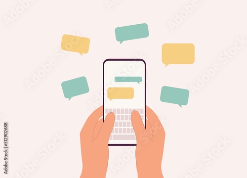 A Person's Hand Holding Mobile Phone With Online Text Messaging Bubble Speech. Close-Up. Character, Cartoon.