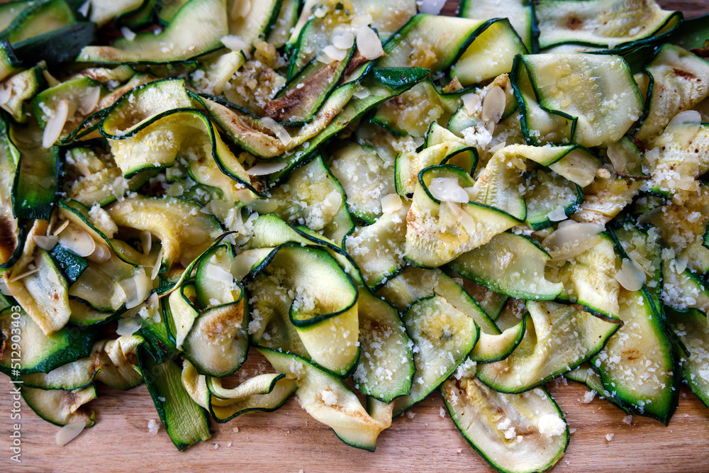 Zucchini and Parmigiano and Almonds Plate - Full frame from Above Zucchini and Parmigiano and Almonds Plate - Full frame from Above