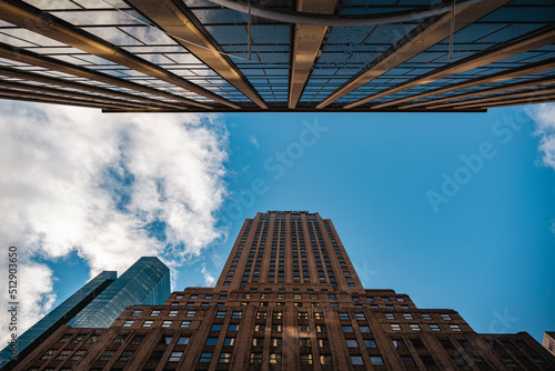 Looking directly up at the skyline of the financial district in Manhattan NYC. High-quality photo