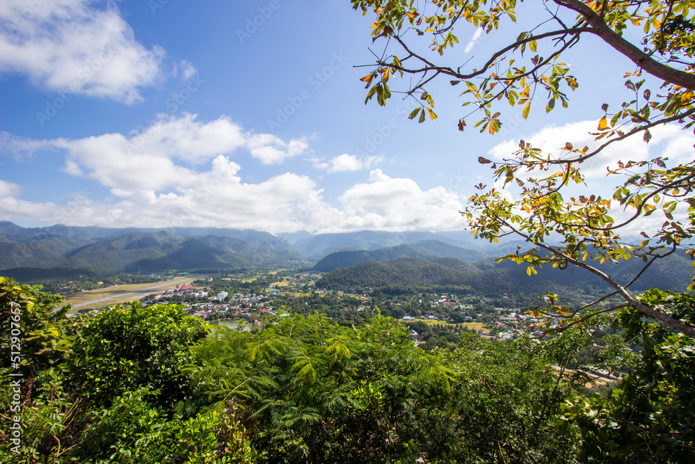 The scenery of Mae Hong Son town,Chong Kham Lake,the airport and forested hills of Burma as seen from Wat Phra That Doi Kong Mu,Mae Hong Son province,Northern Thailand.Non-English texts mean 