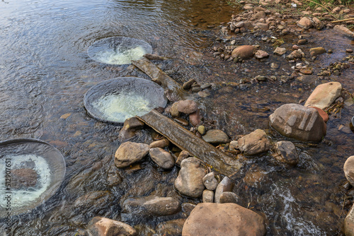 Large pans for boiling salt water in Mang River at Bo Kluea,Nan Province,northern Thailand.