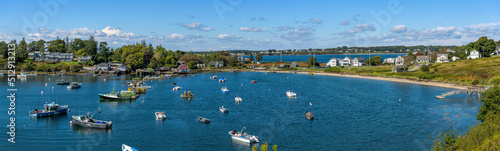 Mackerel Cove - A panoramic overview of lobster boats resting in Mackerel Cove at tip of Bailey Island on a sunny Autumn morning. Bailey Island, Harpswell, Maine, USA. 