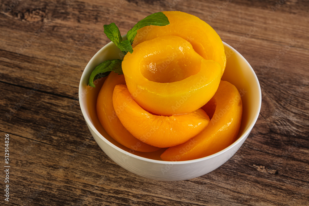 Sweet ripe canned peaches with mint Sweet ripe canned peaches with mint