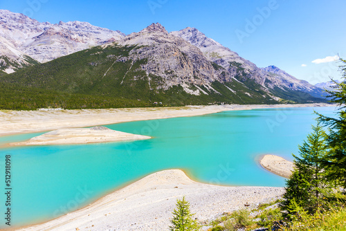 View of beautiful lakes San Giacomo and Cancano in Alpisella valley on sunny summer day, Alps Mountains, Italy photo