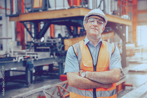 Bild auf Leinwand Senior Heavy Industry Worker workman service team working in metal factory Portrait Happy smiling