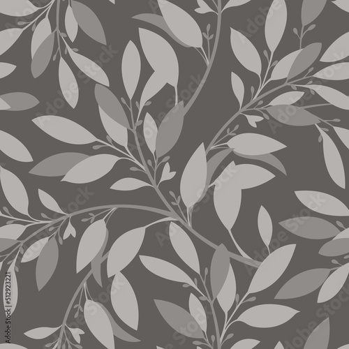Vector floral seamless pattern. Twigs and light coffee colored leaves on a coffee colored background. 