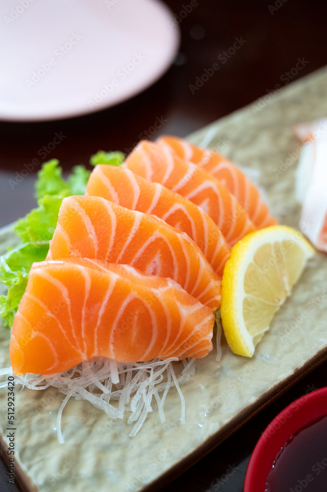 A famous Japanese menu is salmon sashimi. A famous Japanese menu is salmon sashimi.