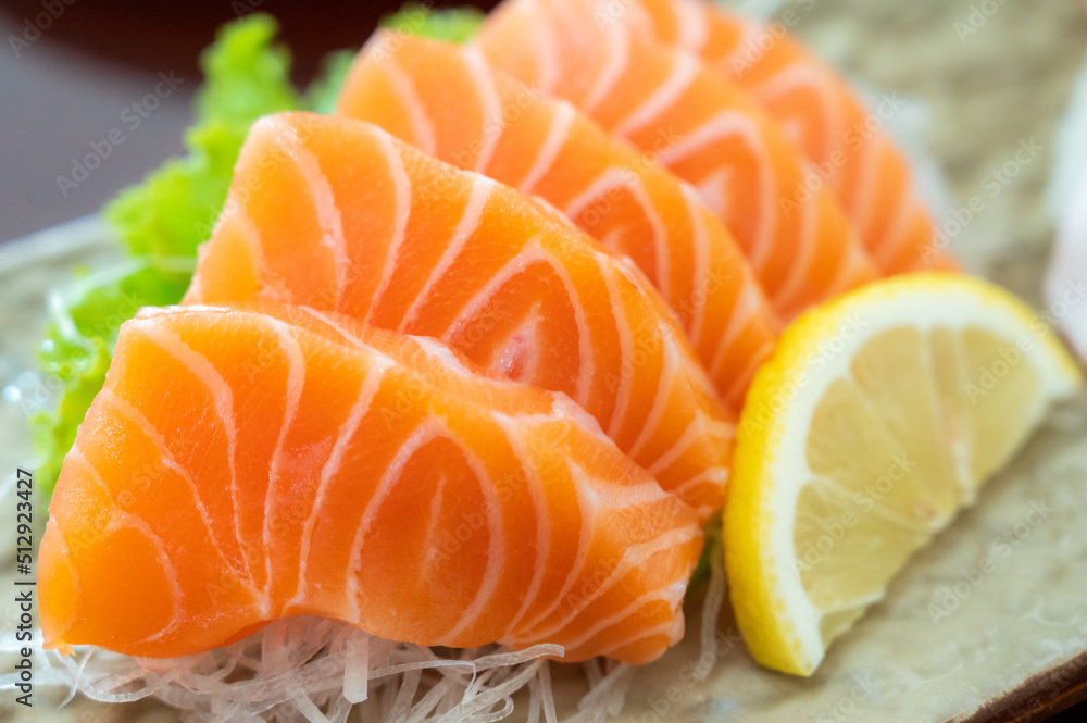 A famous Japanese menu is salmon sashimi. A famous Japanese menu is salmon sashimi.