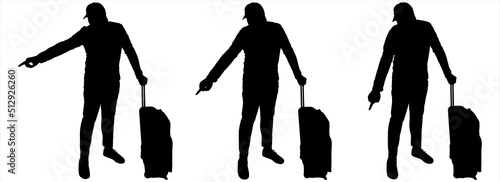 A guy in a cap, with luggage on wheels and a backpack. A person points with his finger in the direction: to the side, down. Tourists are considering something. Three black male silhouettes isolated