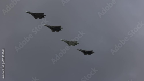 a group of military aircraft flies over Moscow during the rehearsal of the victory parade.