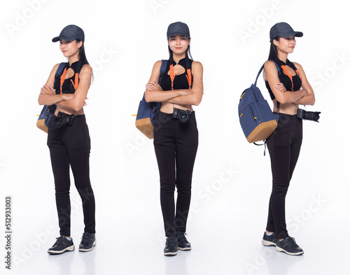 Full length 30s Asian Woman tourist holiday traveller  cross arms confident