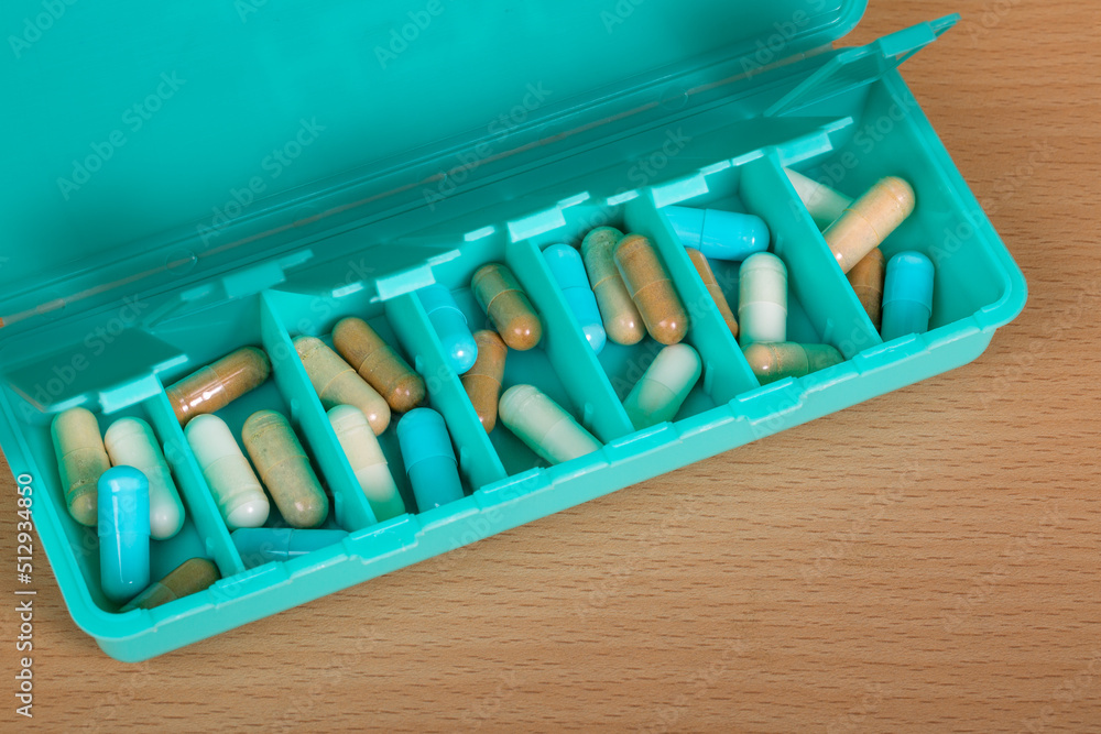 pill box. Concept of health care and social problems of overmedication pill box. Concept of health care and social problems of overmedication
