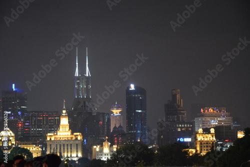 View of night time Shanghai looking from the Pudong side of the Huangpu towards the Bund 