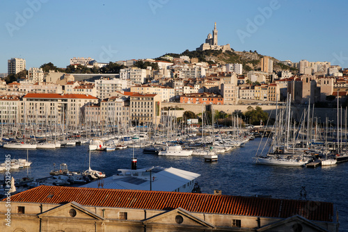 Fototapeta Naklejka Na Ścianę i Meble -  Marseille old harbour and Notre Dame de la Garde basilica. France. 12.06.2017