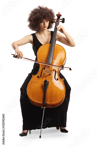 Elegant young woman in a black dress playing a contrabass