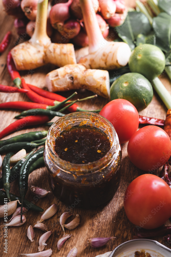 Various fresh vegetables and spices on wooden table Various fresh vegetables and spices on wooden table