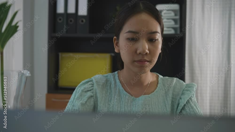 Asian woman working at home, working from home freelancer concept. teleconference online. Asian woman working at home, working from home freelancer concept. teleconference online.