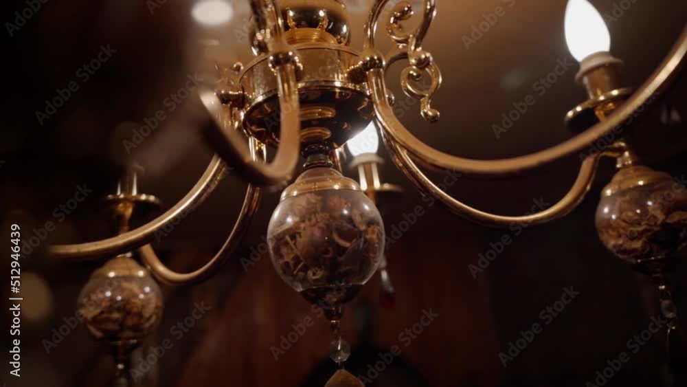 antique chandelier in gold color. lighting device antique chandelier in gold color. lighting device