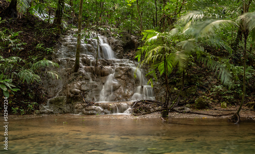 Waterfalls in the forest near archaeological site of Palenque, Mexico photo
