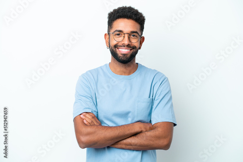 canvas print motiv - luismolinero : Young Brazilian man isolated on white background keeping the arms crossed in frontal position