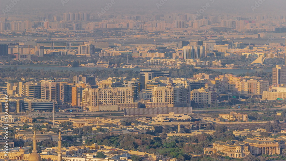 Skyline of the Dubai city with modern skyscrapers in Deira and Zabeel district aerial timelapse