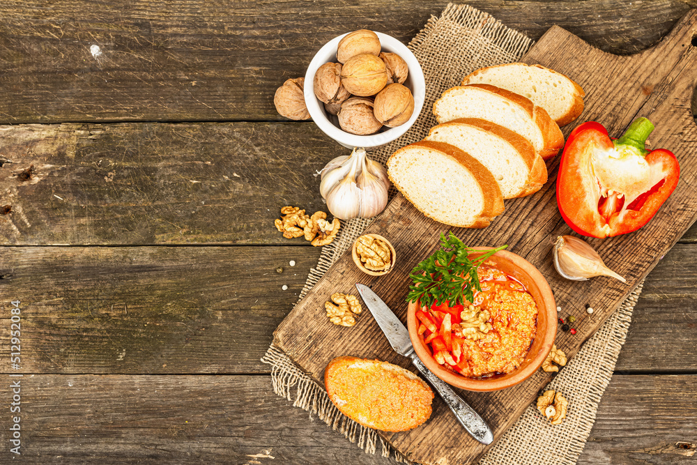 Traditional Middle Eastern dip Muhammara. Roasted red bell pepper with walnuts and spices Traditional Middle Eastern dip Muhammara. Roasted red bell pepper with walnuts and spices