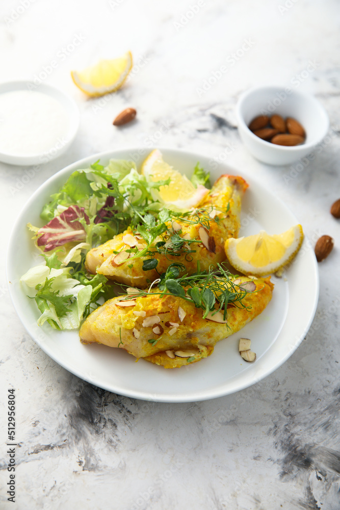 Roasted fish with almond flakes Roasted fish with almond flakes