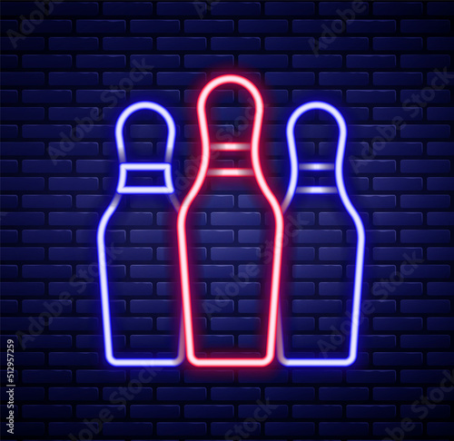 Fotografia, Obraz Glowing neon line Bowling pin icon isolated on brick wall background